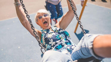 Older lady on a swing