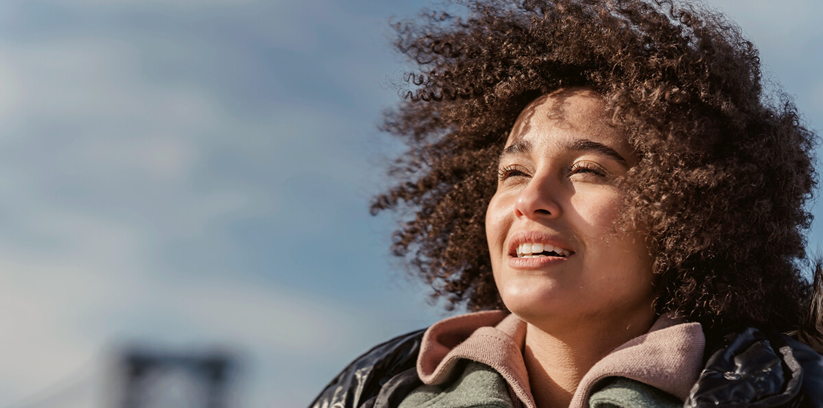 Lady with hair blowing in the wind