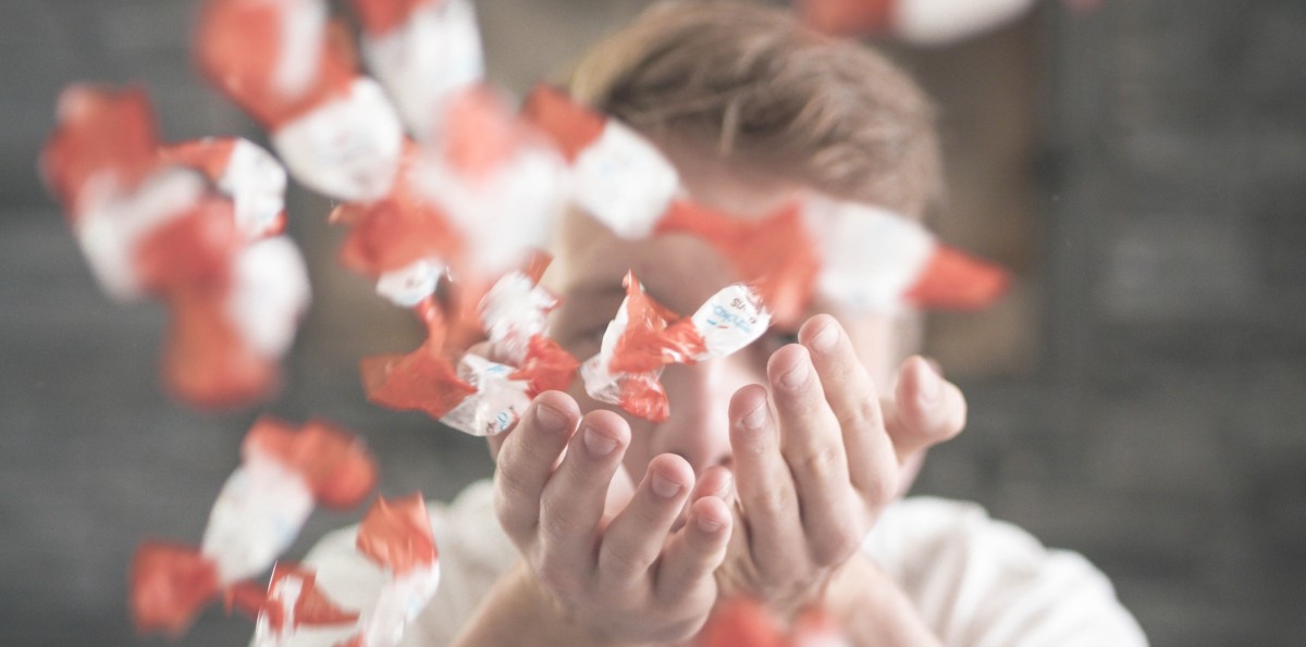 Man blowing confetti 