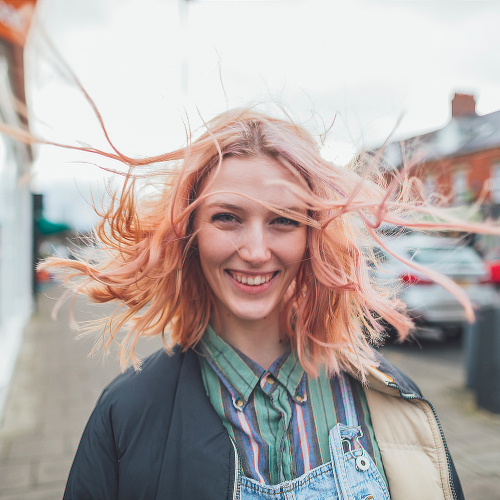 Young woman looking happy