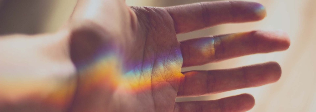 hand with rainbow