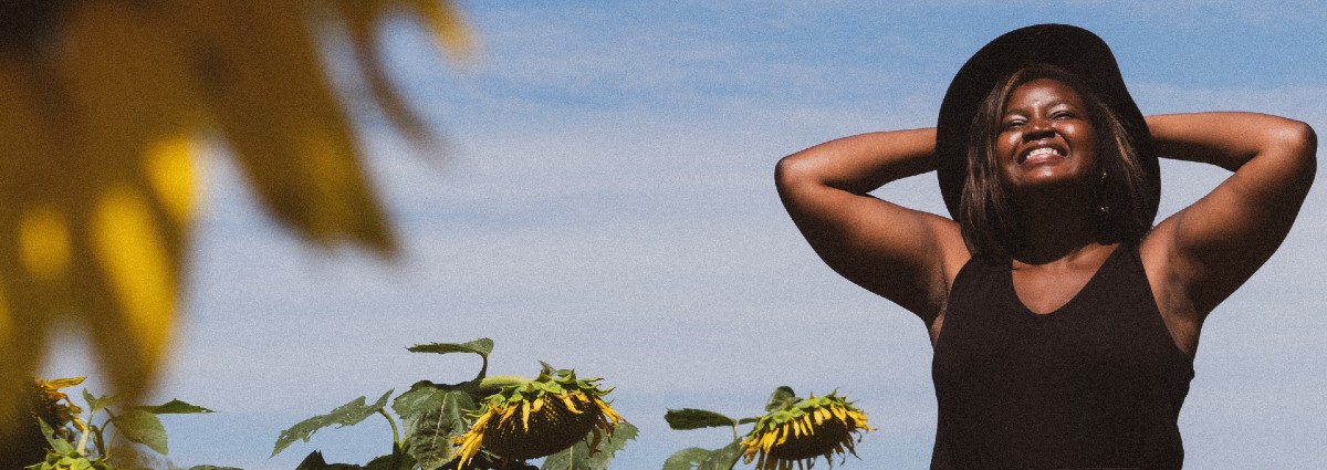 woman smiling in the sun