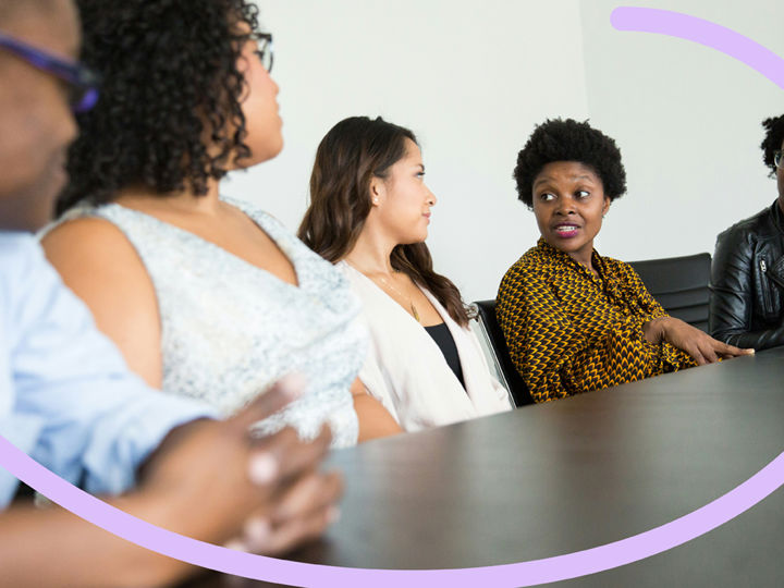 Boardroom with group of people at the table.jpg