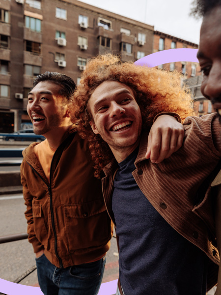 Group of friends walking and smiling together - with Clinical Partners brand expression.jpg