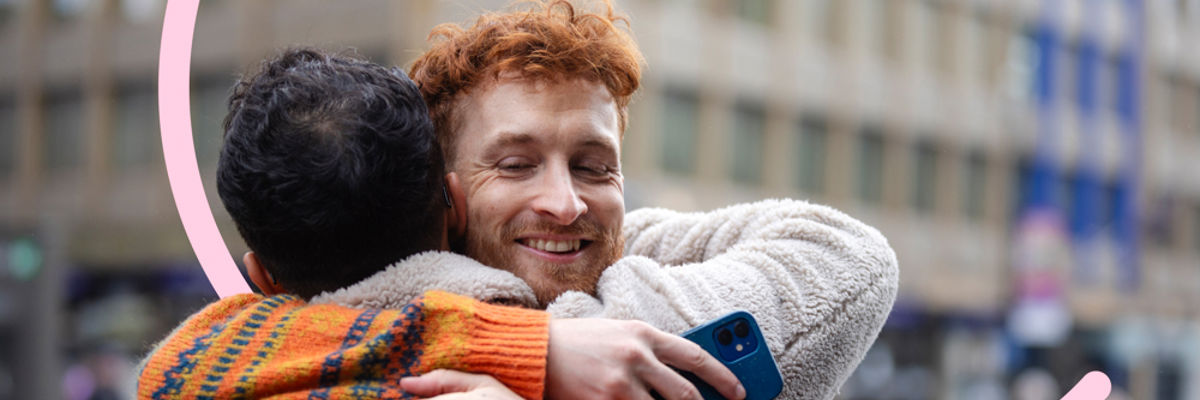 Two men hugging outside.jpg