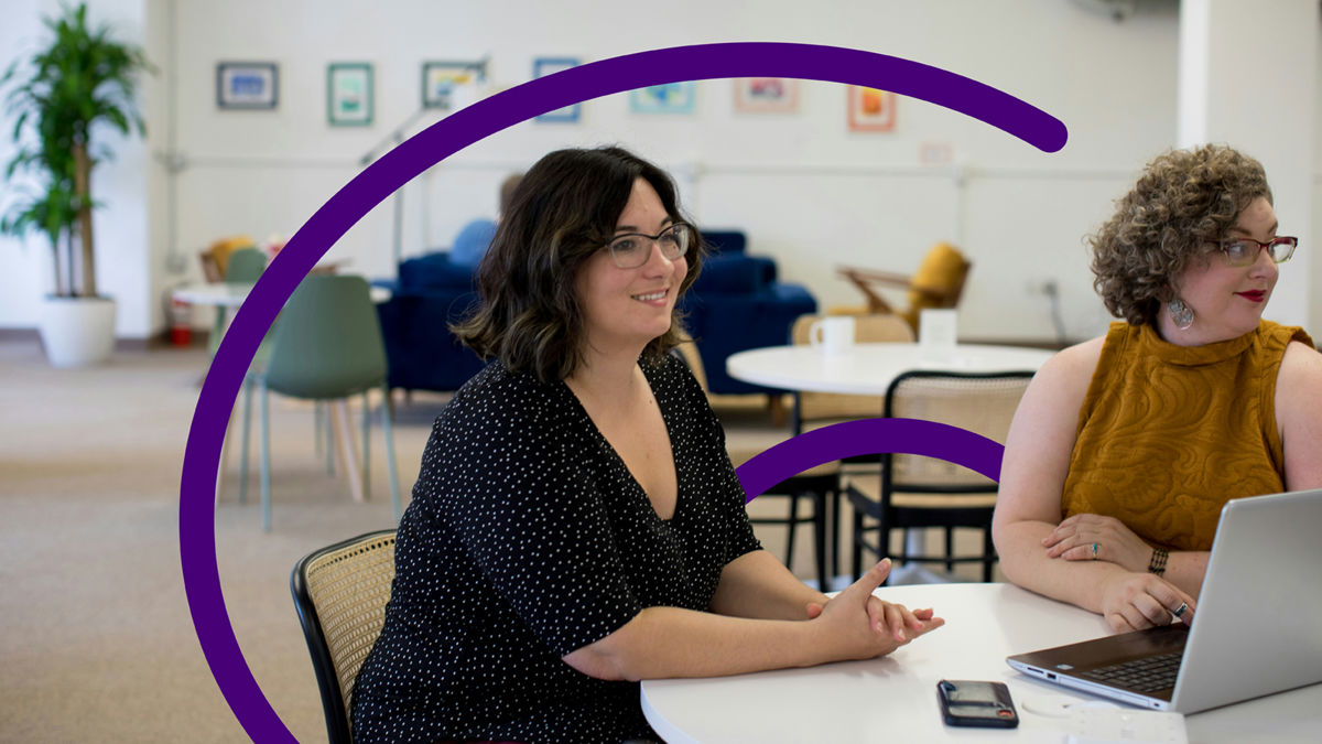 Two women working with a laptop.jpg