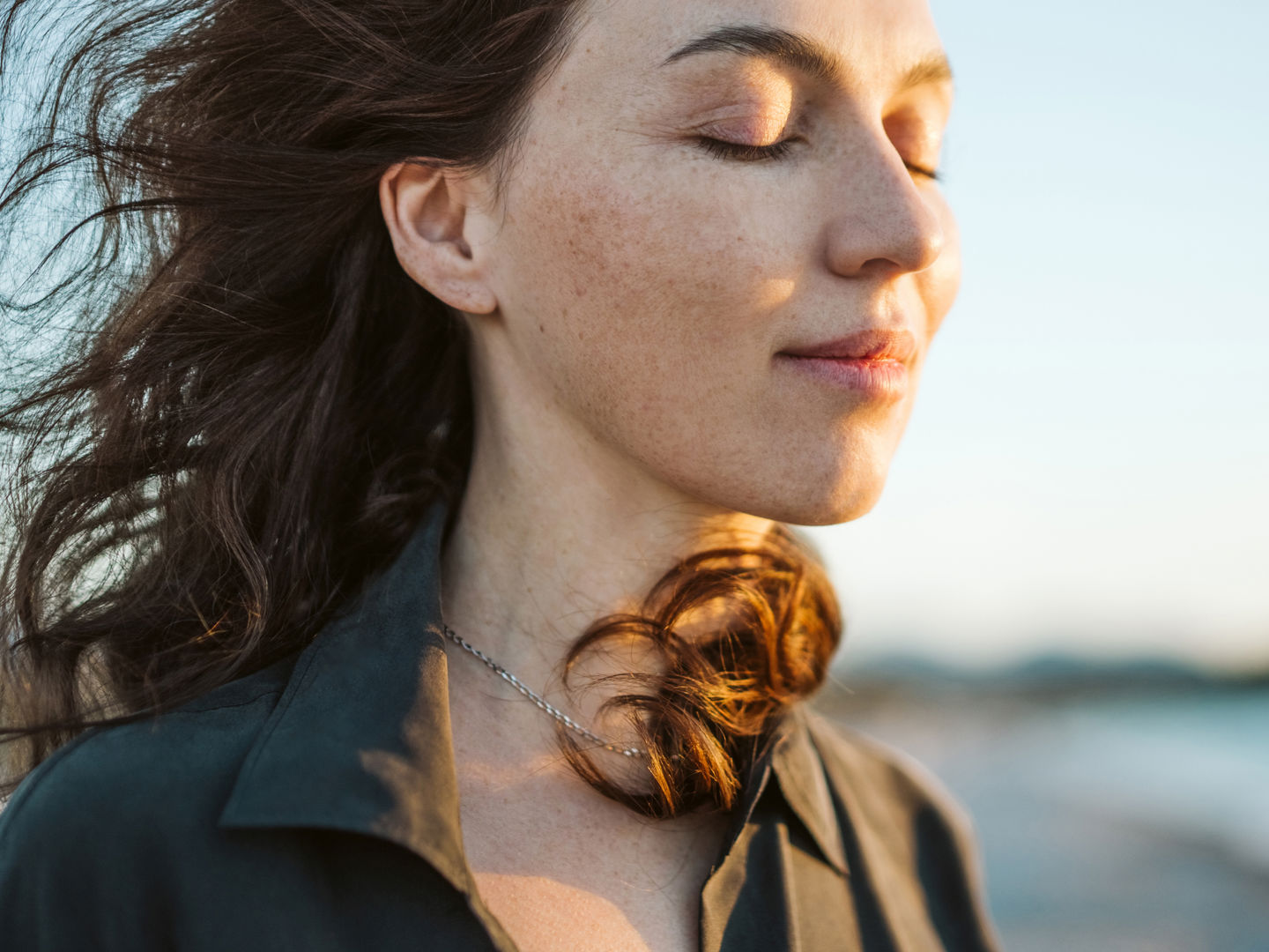 Women with calm expression and eyes closed