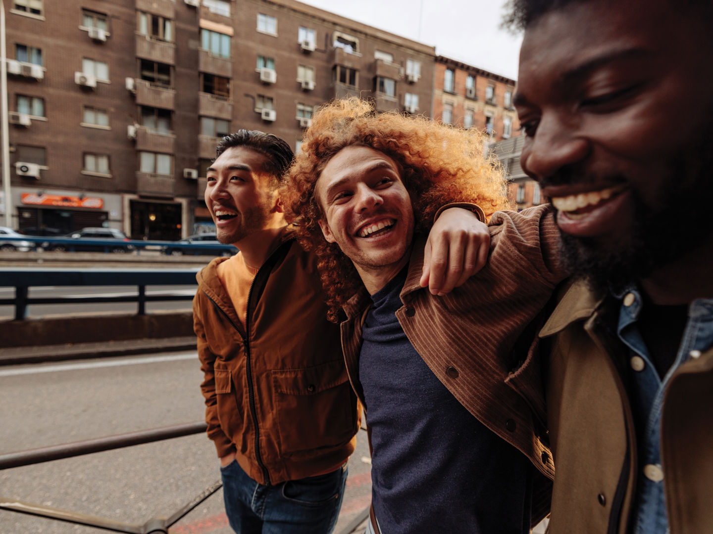 Group of friends walking and smiling together