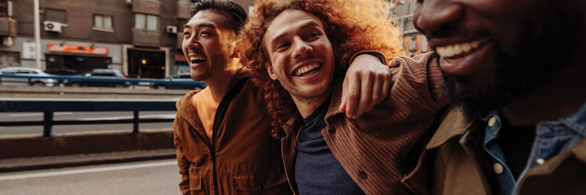 Group of friends walking and smiling together