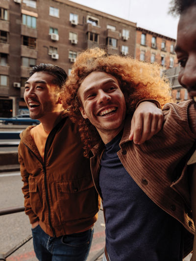 Group of friends walking and smiling together.jpg