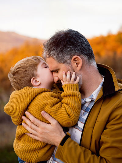 Man holding a young child