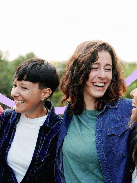Group of people smiling at one another - with Clinical Partners brand expression.jpg