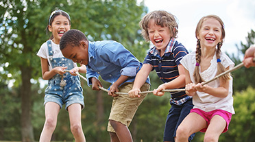 children playing tug of war